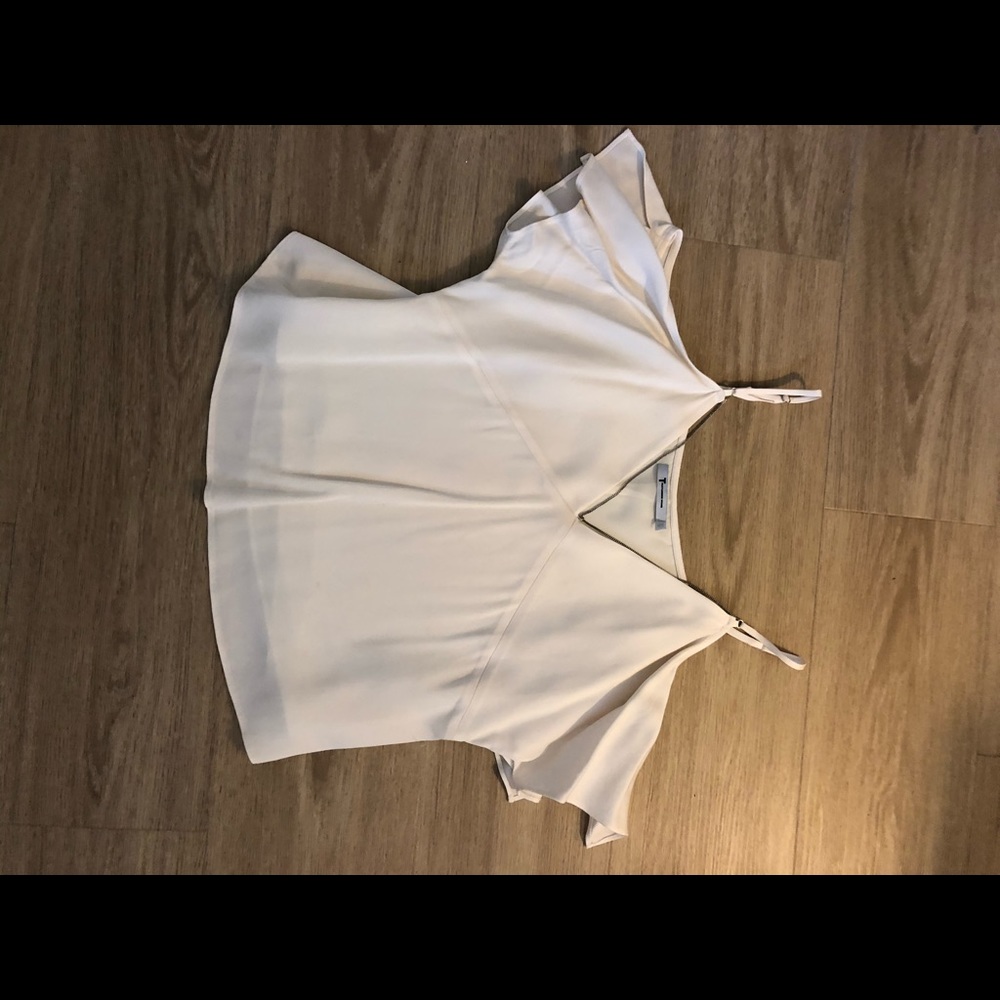 Open shoulder white v-neck top